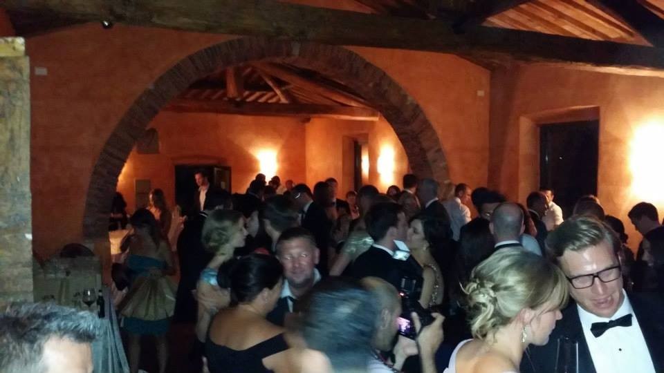 Castello di Meleto, the wedding partyinside the scuderia.