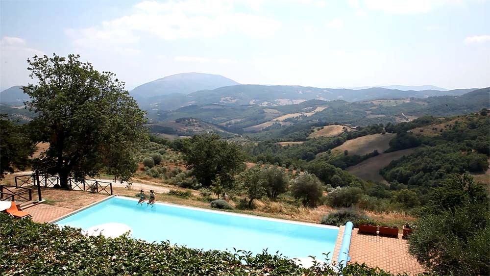 Casa Bruciata wedding band Umbria - The view from the pool